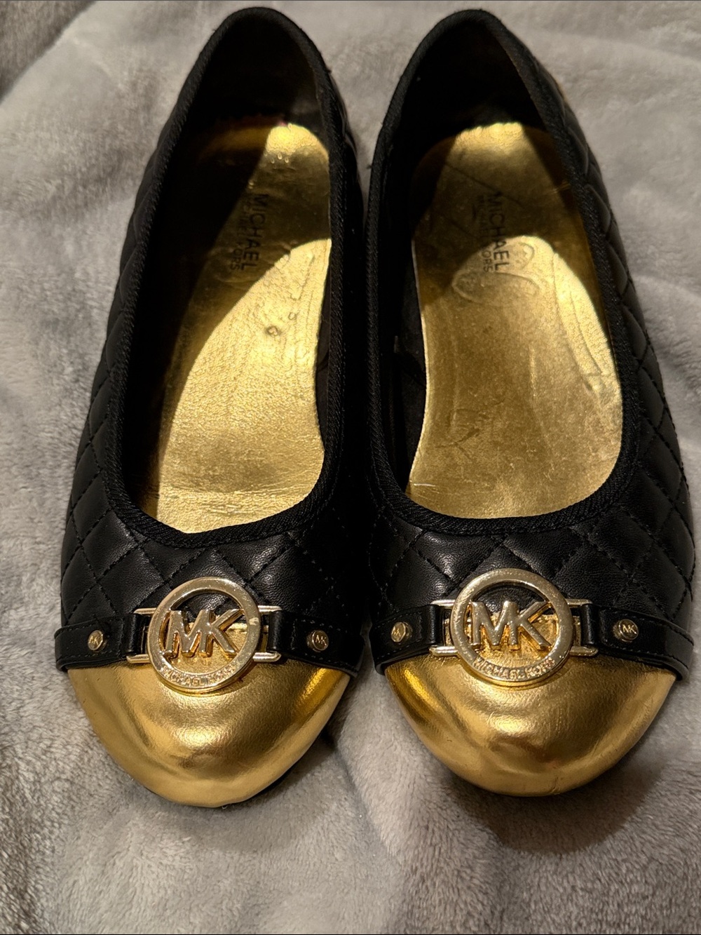 Michael Kors Black Quilted Ballet Flats with Gold Toe Caps